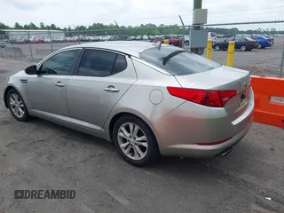 2013 Kia Optima EX z VIN 5XXGN4A70DG251141, wystawiony jako IAAI lot #42410478 z przebiegiem 245 963 mil mil oraz . Historia ofert i sprzedaży dostępna na DreamBid. Obrazek 3.