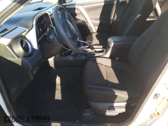 2016 Toyota RAV4 LE with VIN JTMZFREV7GJ089388, listed as a Copart auction lot 85863754 with 102,395 mi miles and Salvage Title. Bid and sale history available at DreamBid. Image 7.