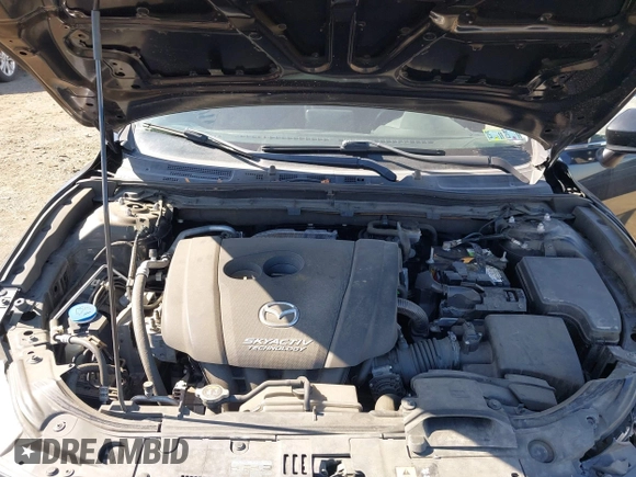 2016 Mazda 3 i Sport with VIN JM1BM1U73G1337468, listed as a IAAI auction lot 41824105 with 96,959 mi miles. Bid and sale history available at carsss.com. Image 10.