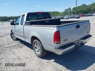 2003 Ford F-150 XL with VIN 1FTRX17W43NA77481, listed as a IAAI auction lot 42155310 with 230,322 mi miles. Bid and sale history available at carsss.com. Image 3.