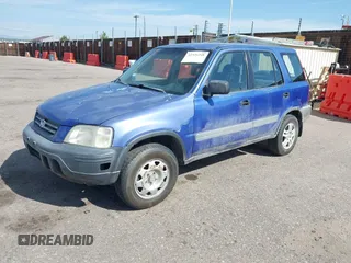 2001 Honda CR-V LX z VIN JHLRD18431C026474, wystawiony jako IAAI lot #42326248 z przebiegiem 245 819 mil mil oraz . Historia ofert i sprzedaży dostępna na DreamBid. Obrazek 2.