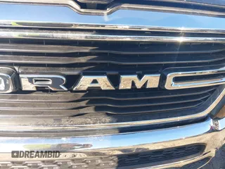 2021 Ram 1500 Big Horn z VIN 1C6RREFG1MN532758, wystawiony jako IAAI lot #41395774 z przebiegiem 66 750 mil mil oraz . Historia ofert i sprzedaży dostępna na DreamBid. Obrazek 16.