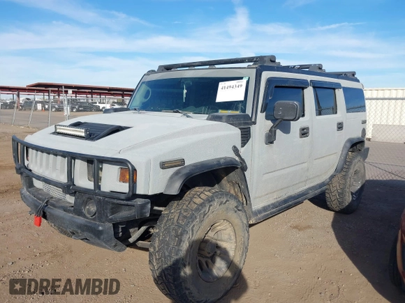 2003 Hummer H2 with VIN 5GRGN23U13H128617, listed as a IAAI auction lot 41494349 with 135,295 mi miles. Bid and sale history available at carsss.com. Image 17.