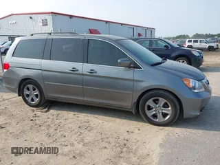 2008 Honda Odyssey Touring z VIN 5FNRL38978B047803, wystawiony jako IAAI lot #42427855 z przebiegiem 125 697 mil mil oraz . Historia ofert i sprzedaży dostępna na DreamBid. Obrazek 14.