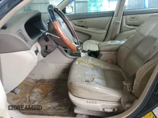 1998 Lexus ES 300 z VIN JT8BF28G7W5048920, wystawiony jako Copart lot #56391015 z przebiegiem 234 109 mil mil oraz Nie do naprawy • Non repairable. Historia ofert i sprzedaży dostępna na DreamBid. Obrazek 7.
