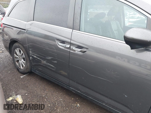 2014 Honda Odyssey EX-L with VIN 5FNRL5H6XEB111412, listed as a IAAI auction lot 41917361 with 210,841 mi miles and . Bid and sale history available at carsss.com. Image 6.
