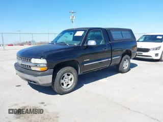 1999 Chevrolet Silverado 1500 LS with VIN 1GCEK14T9XZ213688, listed as a IAAI auction lot 41818993 with 192,743 mi miles. Bid and sale history available at carsss.com. Image 2.