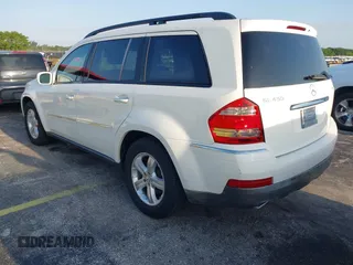 2007 Mercedes-Benz GL-Class with VIN 4JGBF71E77A210198, listed as a IAAI auction lot 42020424 with 104,729 mi miles. Bid and sale history available at carsss.com. Image 3.