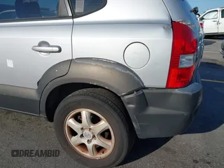 2005 Hyundai Tucson GLS with VIN KM8JN12D65U244033, listed as a IAAI auction lot 41998302 with 219,205 mi miles. Bid and sale history available at carsss.com. Image 14.