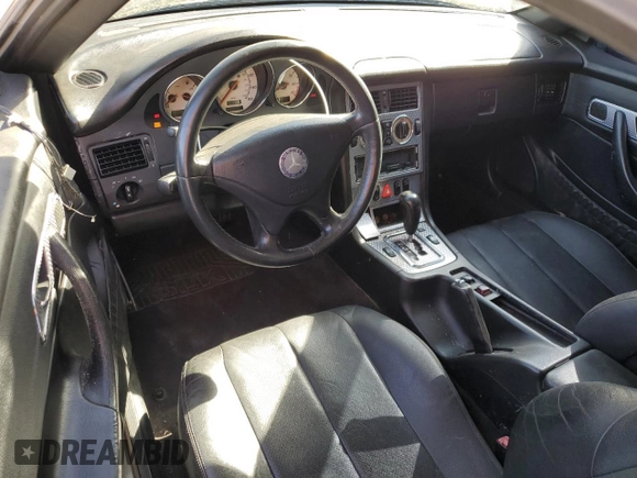 2002 Mercedes-Benz SLK-Class 2.3L Kompressor with VIN WDBKK49FX2F268683, listed as a Copart auction lot 68705174 with 132,677 mi miles and Salvage Title. Bid and sale history available at carsss.com. Image 8.