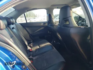 2015 Mitsubishi Lancer Evolution Final Edition z VIN JA32W7FV7FU608214, wystawiony jako Copart lot #68316174 z przebiegiem 56 714 mil mil oraz Szkody całkowita. Historia ofert i sprzedaży dostępna na DreamBid. Obrazek 10.