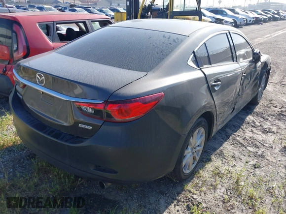 2016 Mazda 6 i Sport with VIN JM1GJ1U57G1425243, listed as a IAAI auction lot 41901771 with 135,155 mi miles and . Bid and sale history available at DreamBid. Image 4.