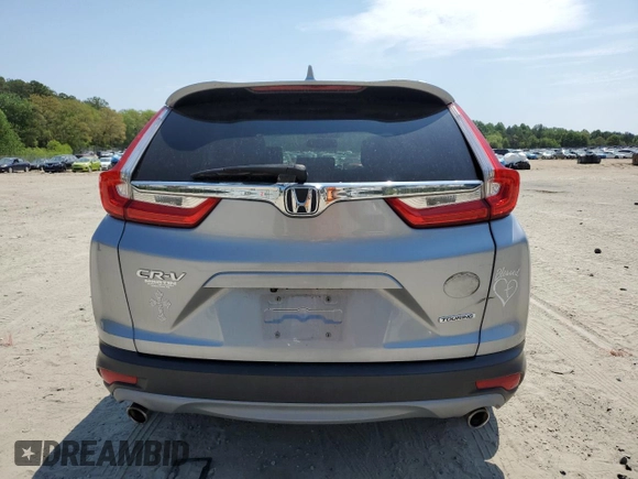 2018 Honda CR-V Touring with VIN 7FARW1H9XJE001467, listed as a Copart auction lot 55222005 with 65,611 mi miles and Salvage title. Bid and sale history available at DreamBid. Image 6.