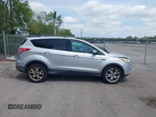2013 Ford Escape SEL with VIN 1FMCU0H97DUD95194, listed as a IAAI auction lot 42052786 with 145,616 mi miles. Bid and sale history available at carsss.com. Image 13.