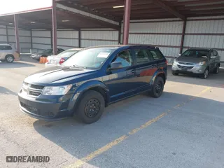 2014 Dodge Journey SE with VIN 3C4PDCAB5ET216618, listed as a IAAI auction lot 41973946 with 151,693 mi miles. Bid and sale history available at carsss.com. Image 2.