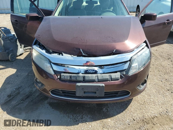 2012 Ford Fusion SE z VIN 3FAHP0HA0CR193143, wystawiony jako Copart lot #62696565 z przebiegiem 150 562 mil mil oraz Szkoda całkowita • Salvage title. Historia ofert i sprzedaży dostępna na DreamBid. Obrazek 11.