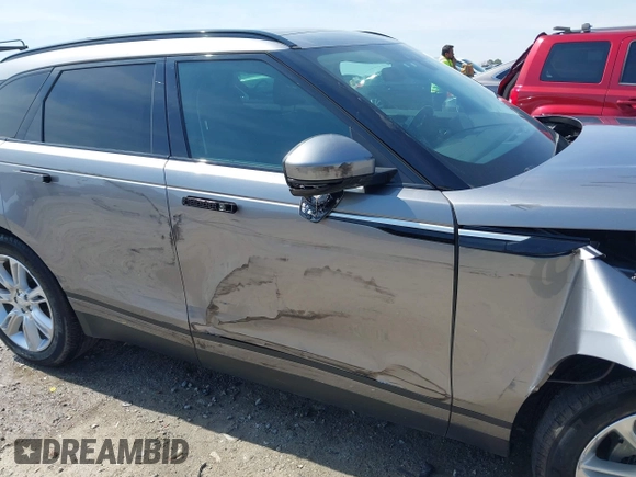 2020 Land Rover Range Rover Velar S z VIN SALYB2EX7LA259607, wystawiony jako IAAI lot #40980294 z przebiegiem 95 967 mil mil oraz . Historia ofert i sprzedaży dostępna na DreamBid. Obrazek 17.