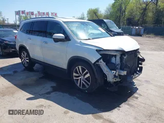 2016 Honda Pilot Touring with VIN 5FNYF6H9XGB005516, listed as a IAAI auction lot 41975049 with 85,217 mi miles. Bid and sale history available at carsss.com. Image 1.