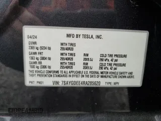 2024 Tesla Model Y Long Range with VIN 7SAYGDEE4RA285620, listed as a Copart auction lot 57883015 with 18,841 mi miles and Salvage title. Bid and sale history available at DreamBid. Image 12.