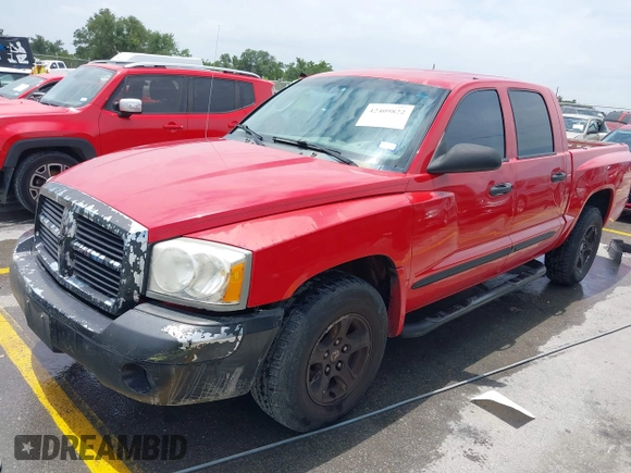 2005 Dodge Dakota SLT z VIN 1D7HE48N65S209630, wystawiony jako IAAI lot #42409822 z przebiegiem 224 849 mil mil oraz . Historia ofert i sprzedaży dostępna na DreamBid. Obrazek 2.
