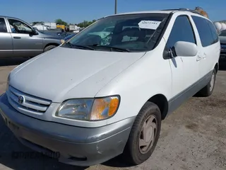 2002 Toyota Sienna LE with VIN 4T3ZF13C42U427293, listed as a IAAI auction lot 42072584 with 279,436 mi miles. Bid and sale history available at carsss.com. Image 6.