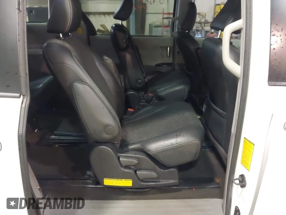 2014 Toyota Sienna SE with VIN 5TDXK3DC7ES497390, listed as a IAAI auction lot 42037096 with 169,127 mi miles and . Bid and sale history available at DreamBid. Image 8.