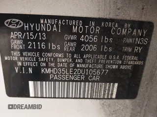 2013 Hyundai Elantra GT with VIN KMHD35LE2DU105677, listed as a IAAI auction lot 42027623 with 137,063 mi miles. Bid and sale history available at carsss.com. Image 9.