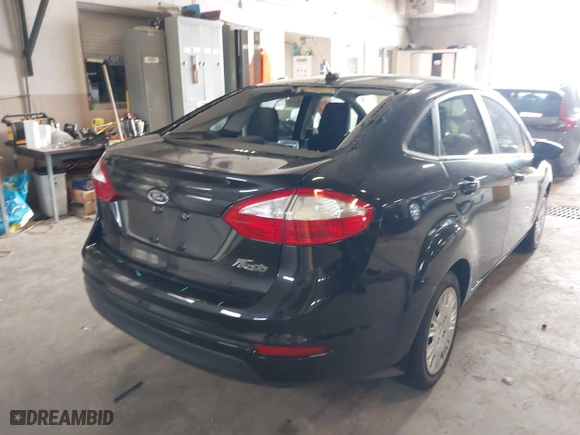 2015 Ford Fiesta S with VIN 3FADP4AJ0FM186887, listed as a IAAI auction lot 41948072 with 79,447 mi miles. Bid and sale history available at carsss.com. Image 4.