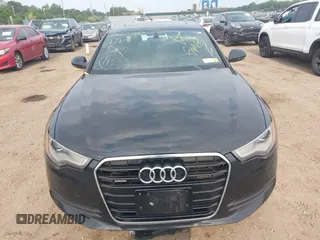 2015 Audi A6 Premium Plus z VIN WAUGFAFCXFN010306, wystawiony jako IAAI lot #42505993 z przebiegiem Nie podano mil oraz . Historia ofert i sprzedaży dostępna na DreamBid. Obrazek 11.