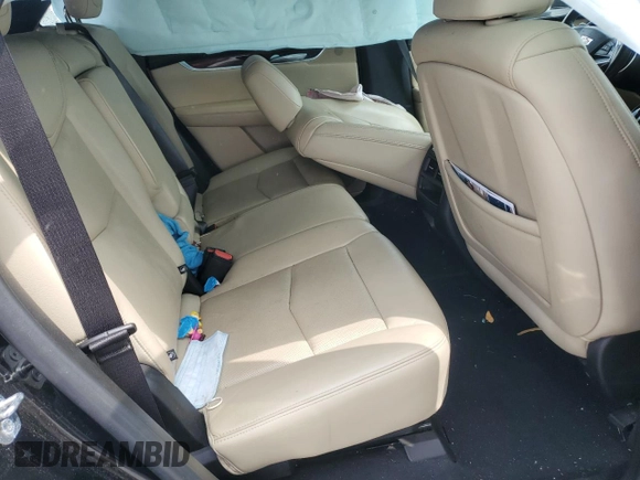 2018 Cadillac XT5 Premium Luxury FWD z VIN 1GYKNERS9JZ234513, wystawiony jako Copart lot #54105735 z przebiegiem 127 345 mil mil oraz Szkoda całkowita • Salvage title. Historia ofert i sprzedaży dostępna na DreamBid. Obrazek 10.