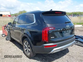 2021 Kia Telluride S with VIN 5XYP6DHC9MG103470, listed as a IAAI auction lot 42073853 with 90,942 mi miles and . Bid and sale history available at DreamBid. Image 3.
