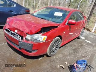 2011 Mitsubishi Lancer ES with VIN JA32U2FU3BU036133, listed as a IAAI auction lot 41970838 with 142,838 mi miles. Bid and sale history available at carsss.com. Image 2.