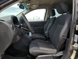2016 Jeep Compass Sport z VIN 1C4NJCBA5GD543146, wystawiony jako Copart lot #57117905 z przebiegiem 100 569 mil mil oraz Szkoda całkowita • Salvage title. Historia ofert i sprzedaży dostępna na DreamBid. Obrazek 7.