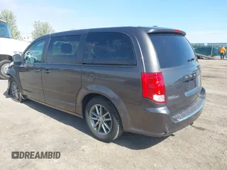 2015 Dodge Grand Caravan SE with VIN 2C4RDGBG2FR684367, listed as a IAAI auction lot 42167621 with 216,628 mi miles and . Bid and sale history available at DreamBid. Image 3.