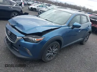 2018 Mazda CX-3 Touring with VIN JM1DKFC78J0322460, listed as a IAAI auction lot 41730662 with 58,841 mi miles. Bid and sale history available at carsss.com. Image 2.