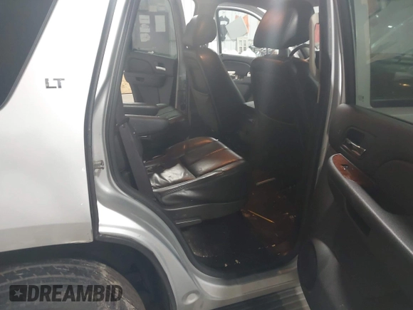2012 Chevrolet Tahoe LT z VIN 1GNSCBE01CR326465, wystawiony jako IAAI lot #42183450 z przebiegiem 220 129 mil mil oraz . Historia ofert i sprzedaży dostępna na DreamBid. Obrazek 8.