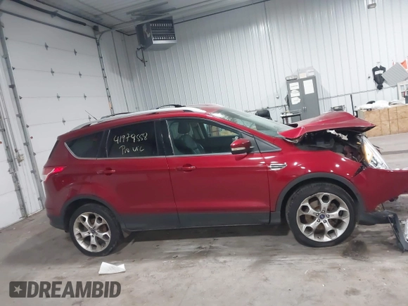 2013 Ford Escape Titanium with VIN 1FMCU9J98DUA72061, listed as a IAAI auction lot 41979558 with 176,667 mi miles and . Bid and sale history available at DreamBid. Image 13.