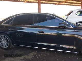 2011 Audi A8 with VIN WAURVAFD1BN027915, listed as a IAAI auction lot 41635275 with 95,143 mi miles and . Bid and sale history available at DreamBid. Image 14.