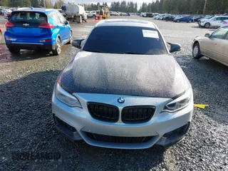 2015 BMW 2 Series 228i with VIN WBA1F5C55FV343662, listed as a IAAI auction lot 41729309 with 90,770 mi miles. Bid and sale history available at carsss.com. Image 13.