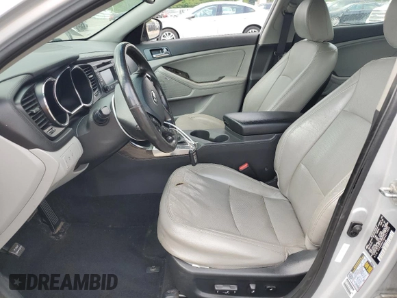 2013 Kia Optima EX z VIN 5XXGN4A79DG217554, wystawiony jako Copart lot #59667065 z przebiegiem 102 482 mil mil oraz Szkoda całkowita • Salvage title. Historia ofert i sprzedaży dostępna na DreamBid. Obrazek 7.