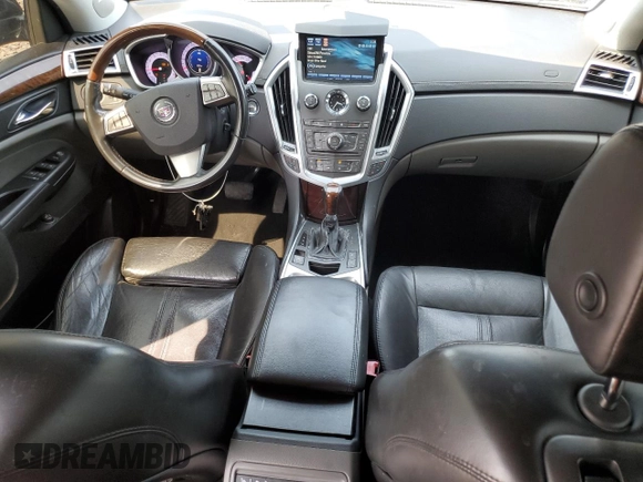 2011 Cadillac SRX Premium Collection z VIN 3GYFNFEY9BS606335, wystawiony jako Copart lot #59009285 z przebiegiem 152 828 mil mil oraz Szkoda całkowita • Salvage title. Historia ofert i sprzedaży dostępna na DreamBid. Obrazek 8.