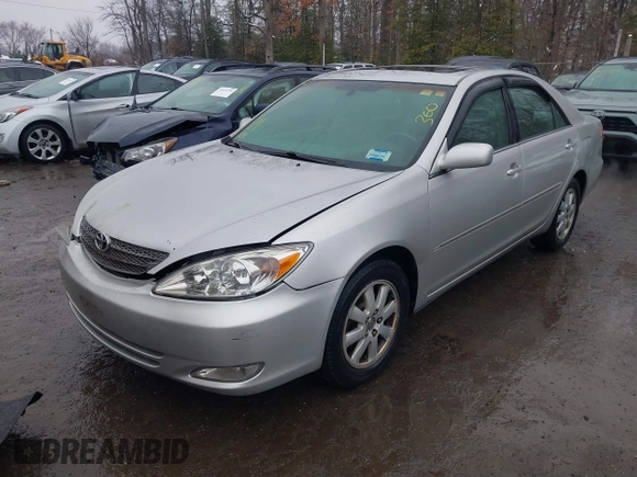 2004 Toyota Camry LE with VIN 4T1BF30K14U578385, listed as a IAAI auction lot 41547709 with 217,434 mi miles. Bid and sale history available at carsss.com. Image 17.