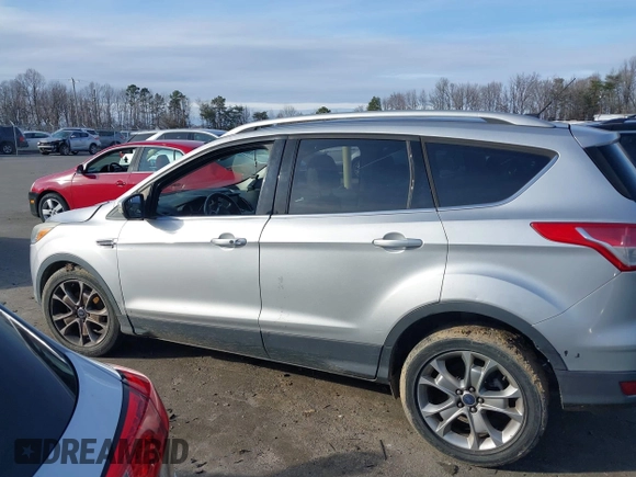 2014 Ford Escape Titanium with VIN 1FMCU0JX3EUB22005, listed as a IAAI auction lot 41610799 with 248,066 mi miles. Bid and sale history available at carsss.com. Image 14.