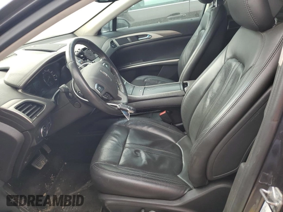 2014 Lincoln MKZ z VIN 3LN6L2JK6ER833317, wystawiony jako Copart lot #50555105 z przebiegiem 157 510 mil mil oraz Szkoda całkowita • Salvage title. Historia ofert i sprzedaży dostępna na DreamBid. Obrazek 7.