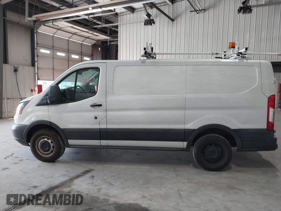 2015 Ford Transit Cargo with VIN 1FTNR1ZM2FKA55134, listed as a IAAI auction lot 42193601 with 96,231 mi miles and . Bid and sale history available at DreamBid. Image 14.