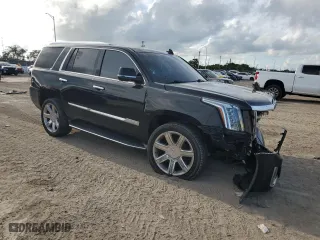 2015 Cadillac Escalade Luxury with VIN 1GYS3MKJ0FR561441, listed as a Copart auction lot 69660374 with 116,593 mi miles and Salvage Title. Bid and sale history available at carsss.com. Image 4.