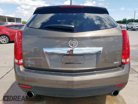 2014 Cadillac SRX Premium Collection with VIN 3GYFNDE33ES567108, listed as a Copart auction lot 55970265 with 97,720 mi miles and Salvage title. Bid and sale history available at DreamBid. Image 6.
