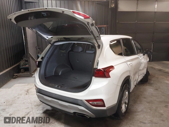 2020 Hyundai Santa Fe SE with VIN 5NMS2CAD8LH163523, listed as a IAAI auction lot 42123756 with 72,992 mi miles and . Bid and sale history available at DreamBid. Image 4.