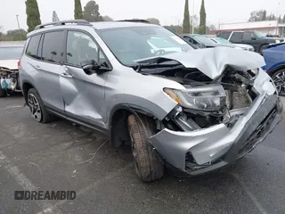 2023 Honda Passport Elite with VIN 5FNYF8H02PB029127, listed as a IAAI auction lot 41166484 with 16,200 mi miles and . Bid and sale history available at DreamBid. Image 1.