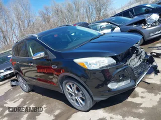 2014 Ford Escape Titanium with VIN 1FMCU0JX1EUE12260, listed as a IAAI auction lot 41826246 with 178,532 mi miles. Bid and sale history available at carsss.com. Image 1.